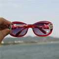 Wine red framed women's polarized sunglasses, oval elegant women's sunglasses, middle-aged women's travel sunscreen street photography glasses